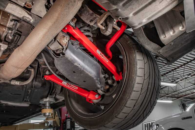 UMI Performance 16-24 Chevrolet Camaro Suspension Trailing Arm - Red - Image 3